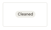 Botão com a palavra 'cleaned' no centro com contorno em cor cinza