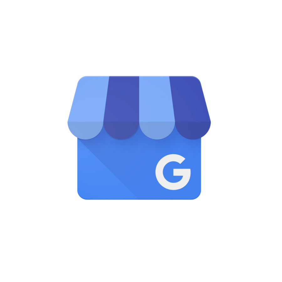 Logo do Google Meu negócio com um desenho de uma tenda com tipos tipos de azul e uma letra 'G' localizada o canto direito inferior